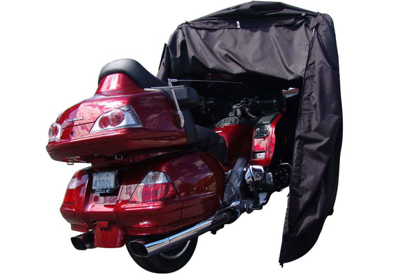 Touring motorcycle inside pro shelter garage