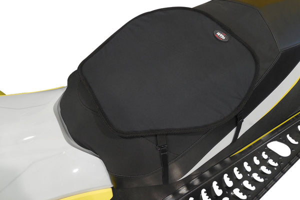 Heated seat pad on snowmobile