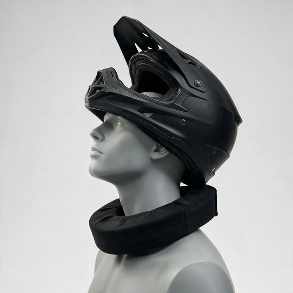 Mannequin with head tilted back, helmet rim meeting the soft foam collar