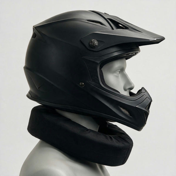 Mannequin in neutral riding position wearing the neck collar under a full-face helmet